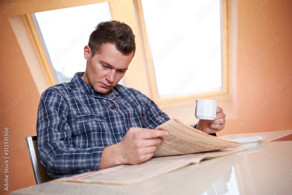 Man reading newspaper Man reading newspaper