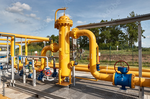 Gas industry, gas transport system. Gas pipeline. Gas pipes, stop valves and appliances for gas pumping station photo