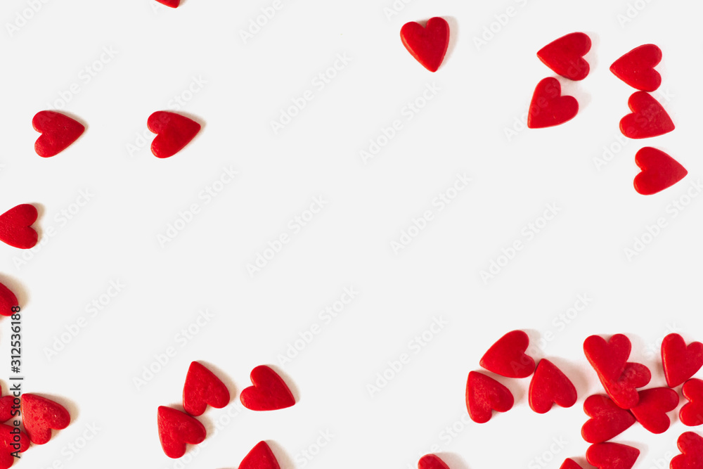  Frame of red confetti in the form of hearts copy space. Decor for baking on Valentine's Day.