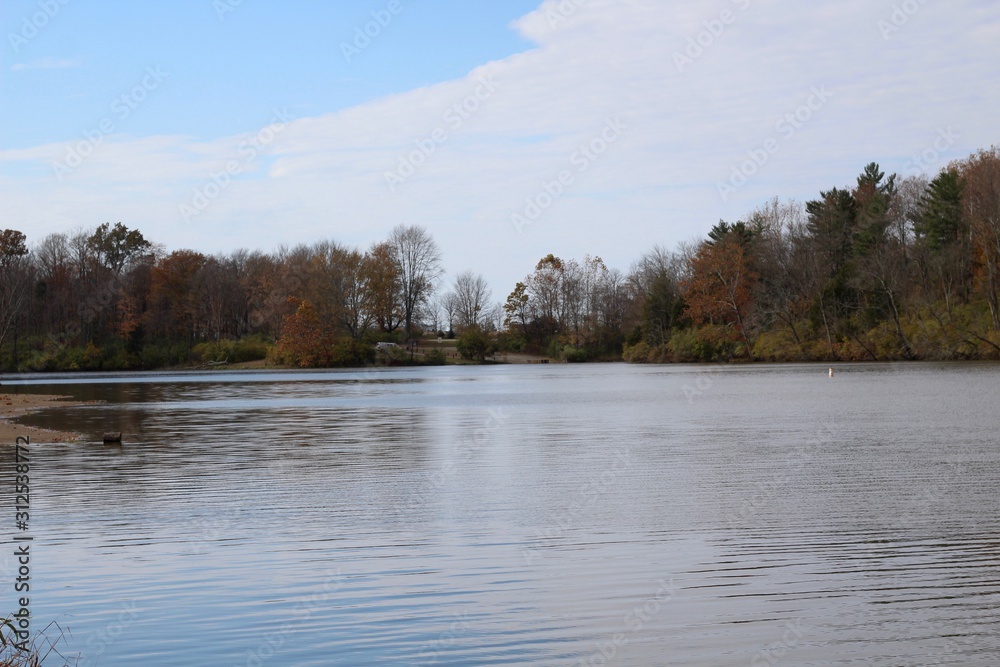 A peaceful view of the lake in the countryside. A peaceful view of the lake in the countryside.