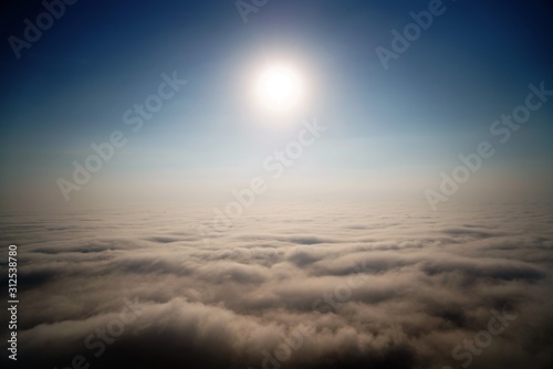 Canvas Print sunset over the bright sky and clouds in hi res