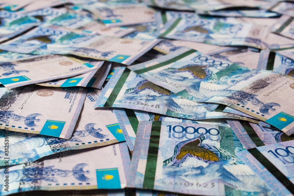 Paper banknotes tenge KZT. Tenge is the national currency of Kazakhstan. bank of Kazakhstan Paper banknotes tenge KZT. Tenge is the national currency of Kazakhstan. bank of Kazakhstan