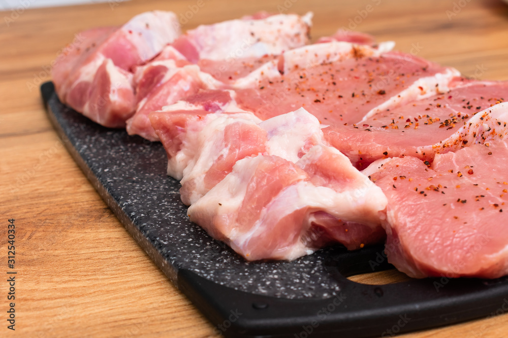 Raw fresh pork or beef meat, sliced 