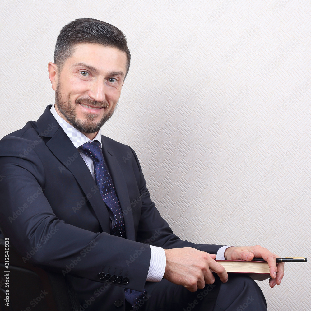 portrait of successful business man in a suit. portrait of successful business man in a suit.