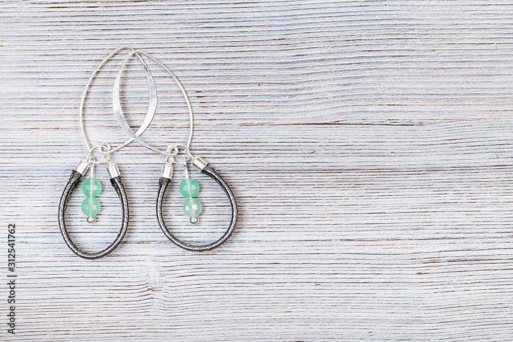 earrings from green jade and leather lace on gray earrings from green jade and leather lace on gray