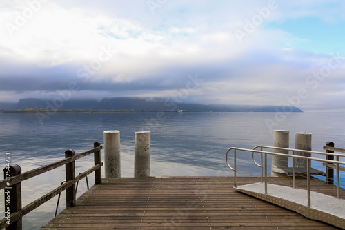View of pier in front of  Lake Geneva in autumn season at Montreux ,switzerland