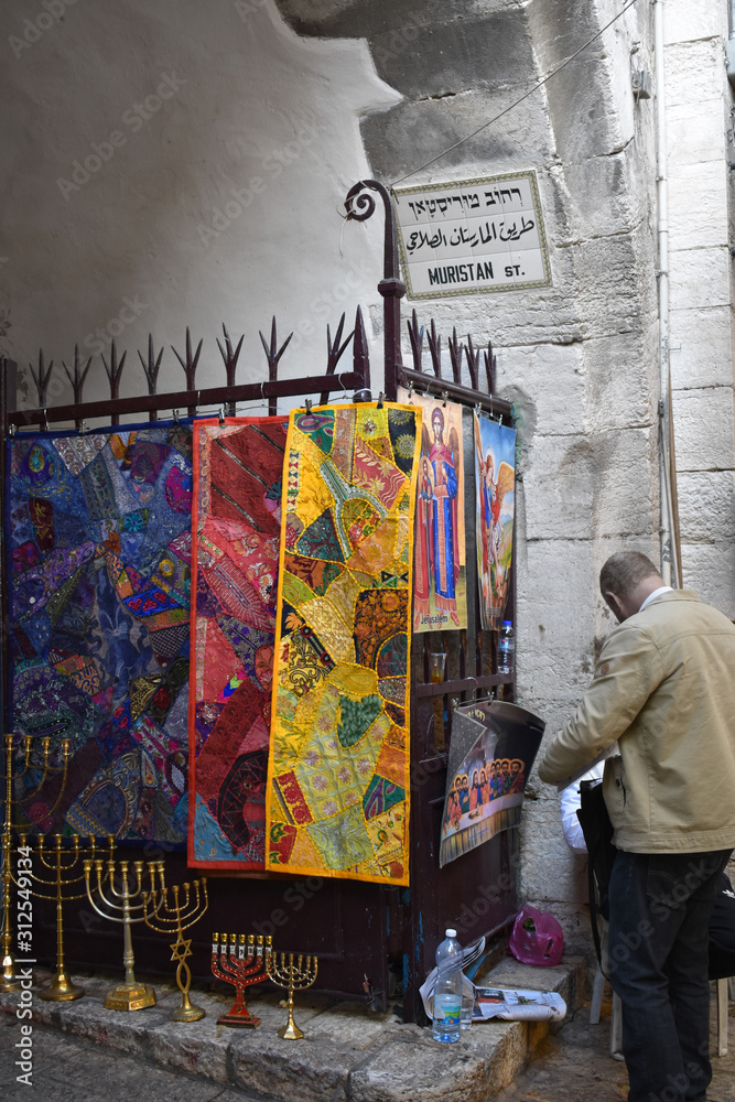 Fototapeta premium shuk, ancient market of old Jerusalem, typical Palestinian clothes