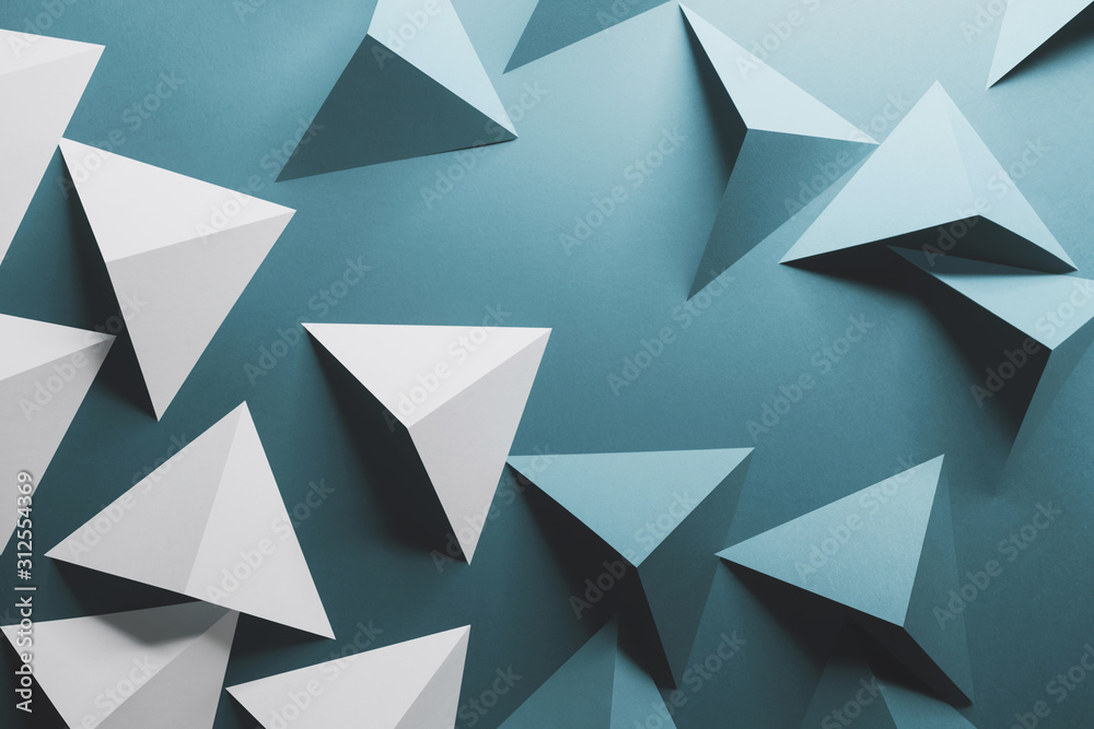 Abstract pattern made of colored paper, blue background Abstract pattern made of colored paper, blue background