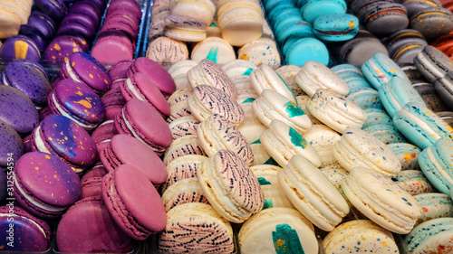 Macaron, French pastry, laid out in rows. Trending blue shades. © Elena Shi