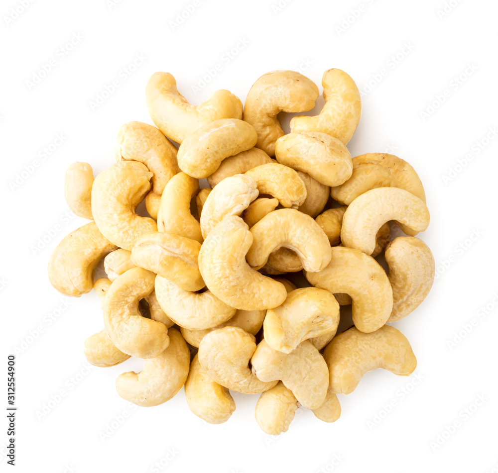 Pile of cashew nuts on a white background. Top view. Pile of cashew nuts on a white background. Top view.