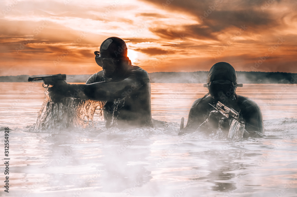 Team of fighters of a special unit move on water to complete the task. The concept of instability, military operations, the cold war. - obrazy, fototapety, plakaty 