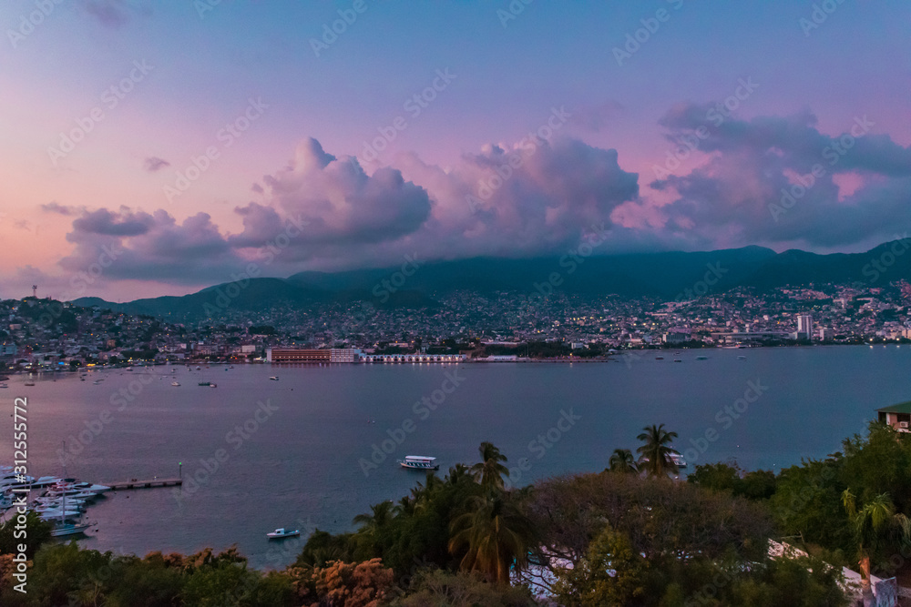 Purple sunset in Acapulco's beach