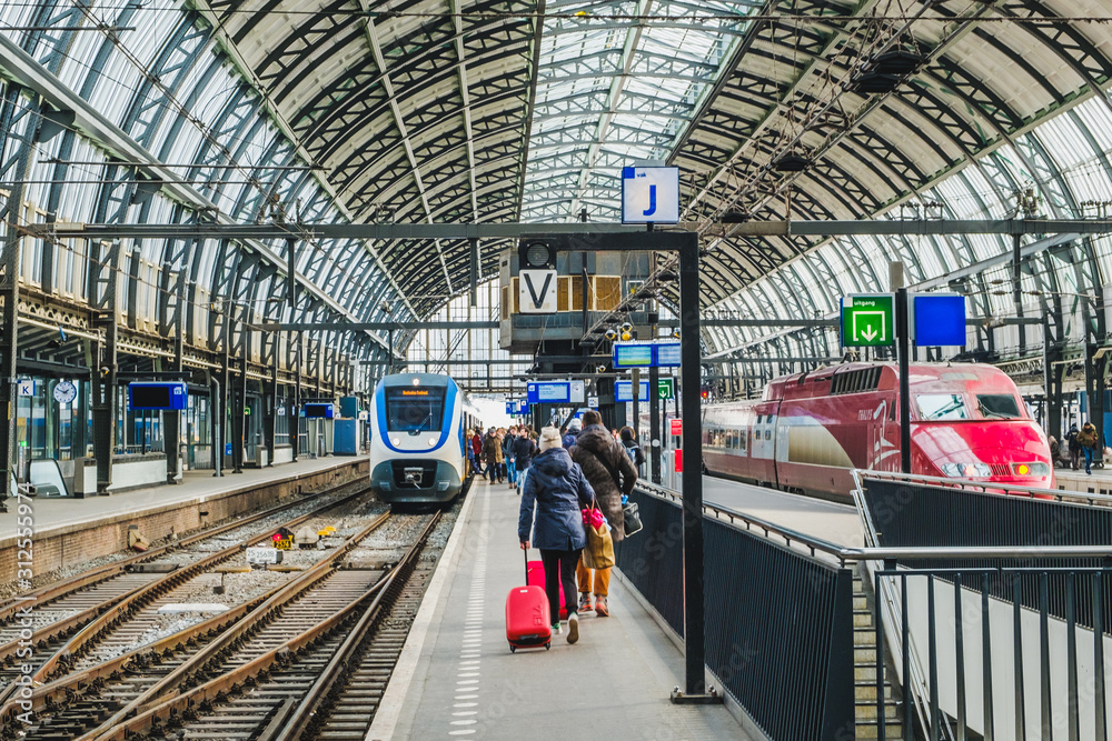 Train station platform at Amsterdam Central station (Amsterdam Centraal ...