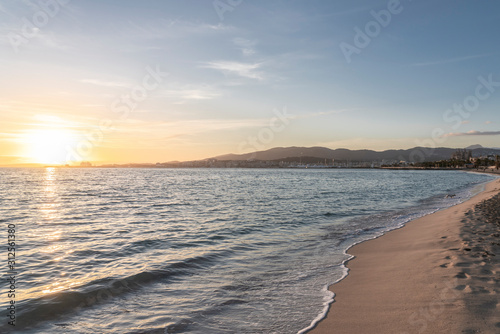 Palma city  in Majorca  Spain. Beautiful promenade landscape at sunset  from the empty beach near Portitxol called Can Pere Antoni