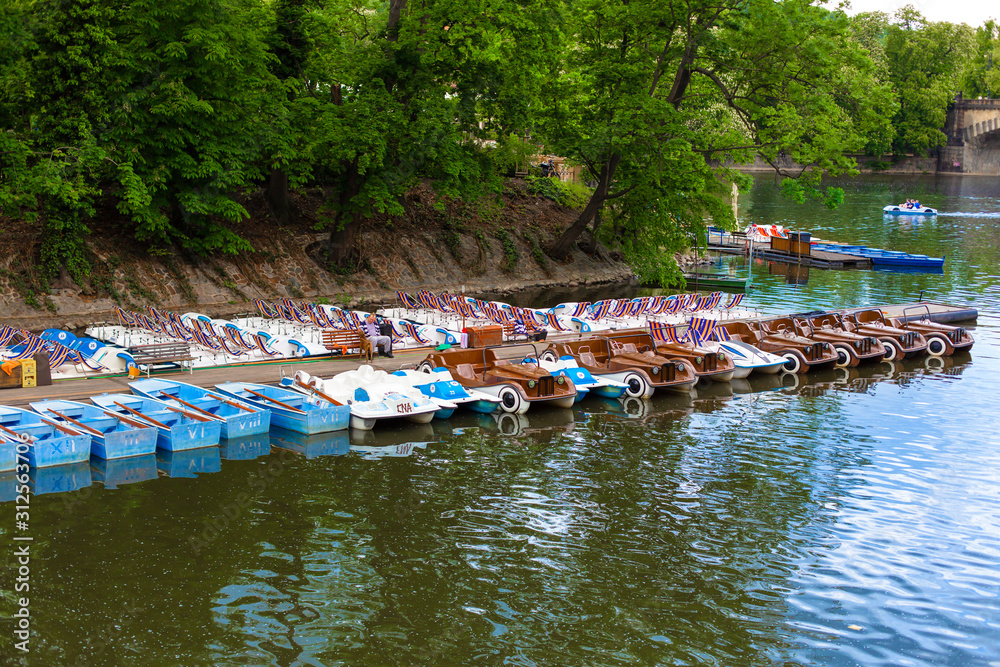 Catamaran rental station. Catamaran walk on the lake Catamaran rental station. Catamaran walk on the lake