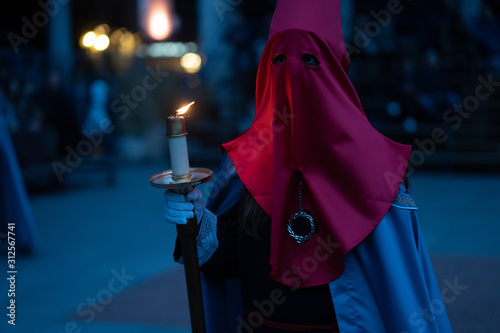 Christian Payer With A Candle. photo