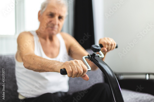 Photography Senior man training at home