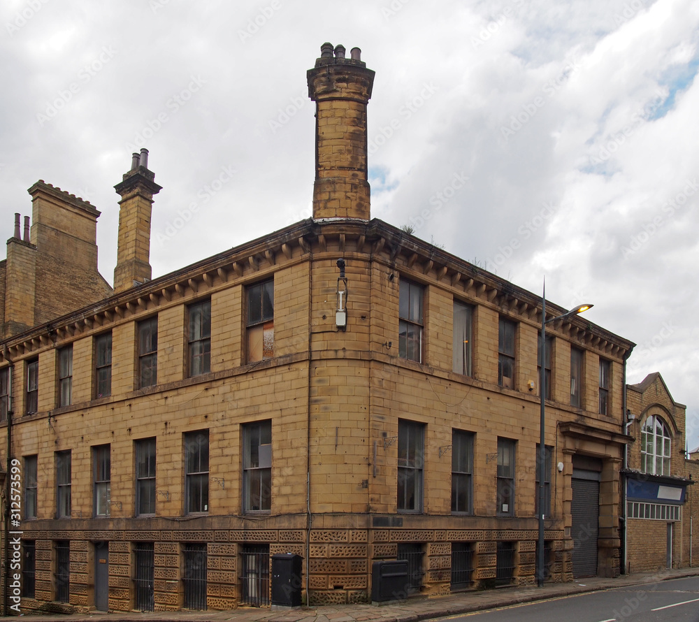 an old 19th century industrial building in the historic little germany district in bradford west yorkshire