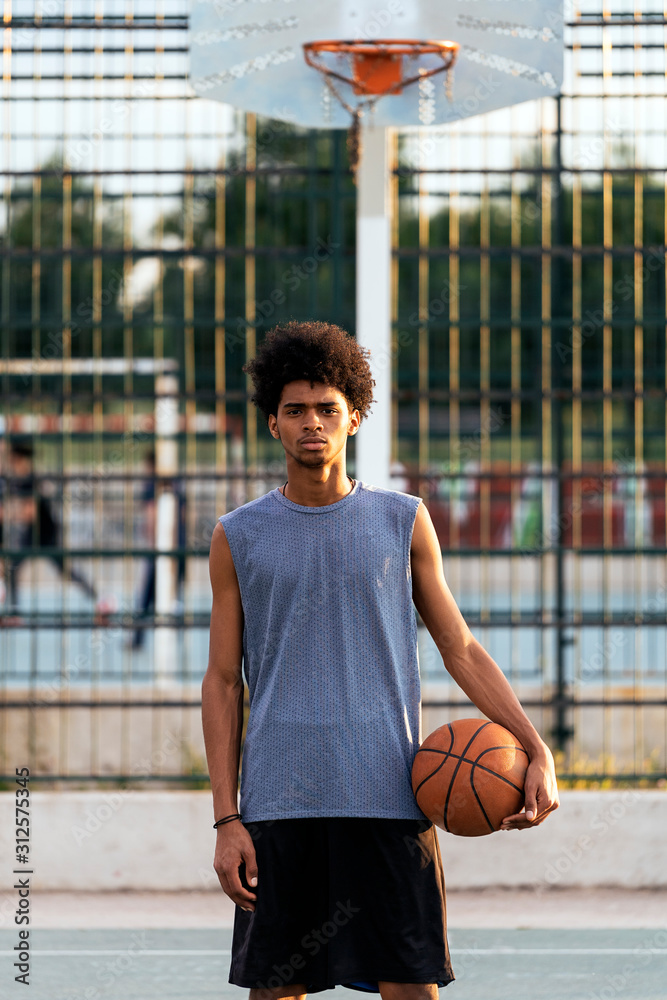 Handsome afro man playing basketball Handsome afro man playing basketball