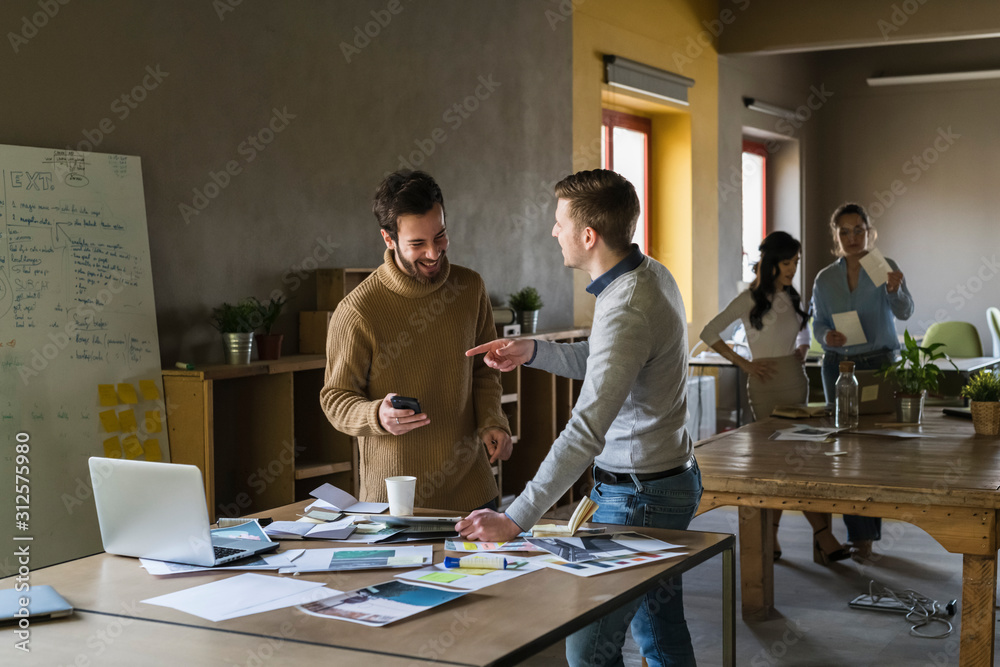 Young businesspeople working in a modern office Young businesspeople working in a modern office