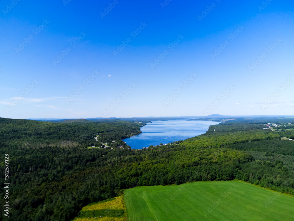 Aerial landscape with lake and blue sky