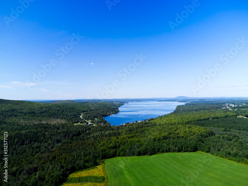 Aerial landscape with lake and blue sky