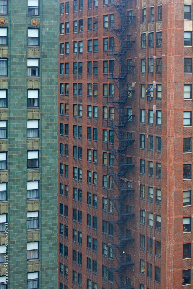 Window cleaner working on a skyscraper in Chicago, Illinois, United States