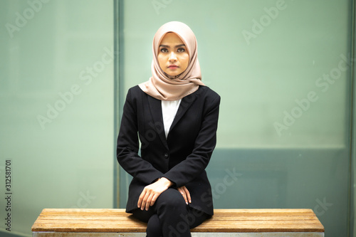 Businesswoman portrait with blurred background.