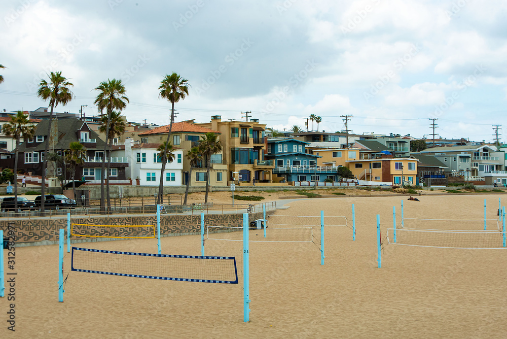 Million Dollar Beach Homes along Strand and beach volleyball courts