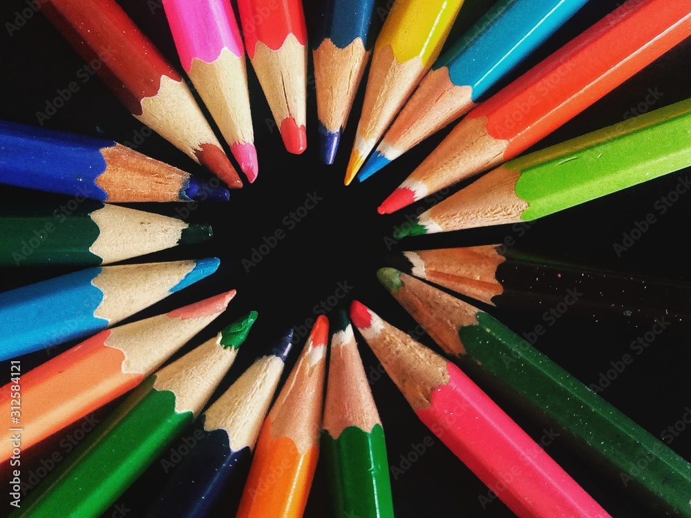 colored pencils isolated on black background colored pencils isolated on black background