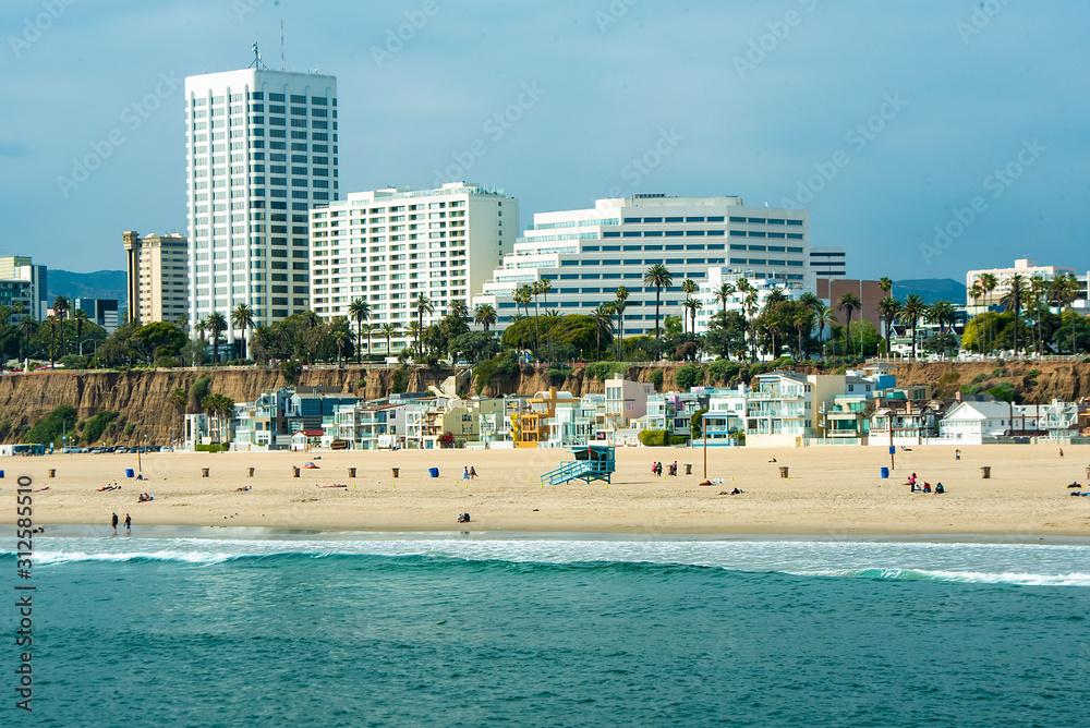 beach in los angeles with art deco buildings in background