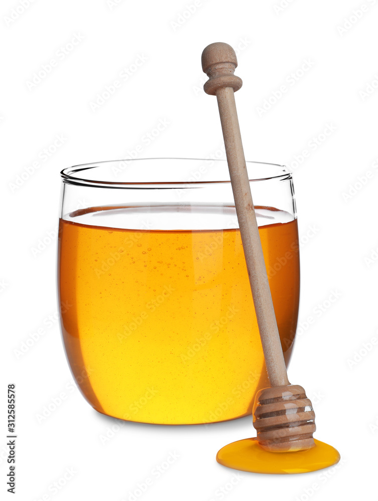 Jar of organic honey and dipper isolated on white Jar of organic honey and dipper isolated on white