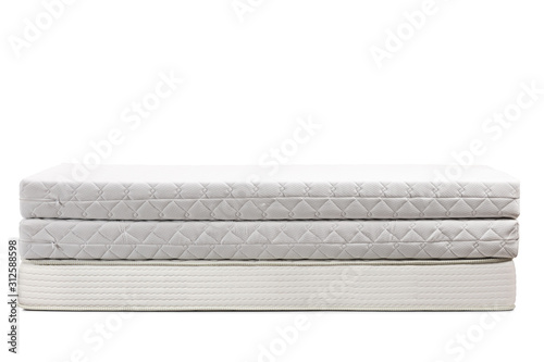 Studio shot of three bed mattresses on top of each other