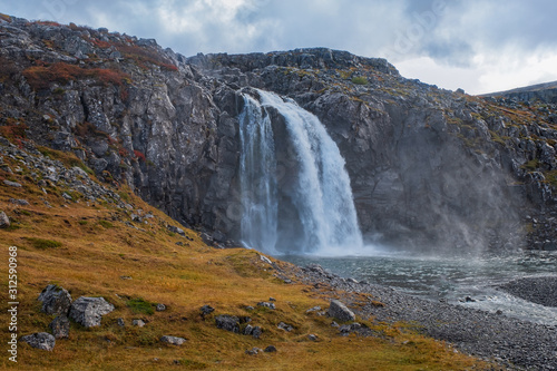 Beautiful little waterfall Fossa  Reykjarfjordurin Iceland. September 2019