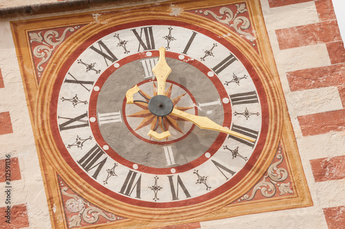 A detail of the clock painted on the bell tower of the St. Cristina little church in Val Gardena, recently restored it shows all its original vivid colors