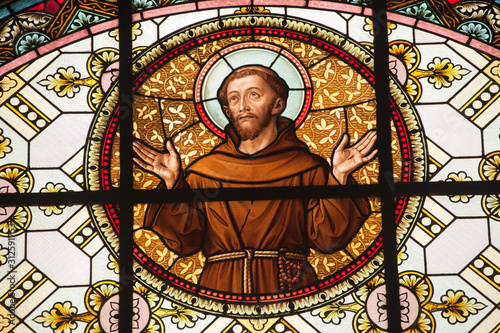 A detail of St.Antonio painted on the glass window on the St. Cristina little church in Val Gardena, recently restored it shows all its original vivid colors