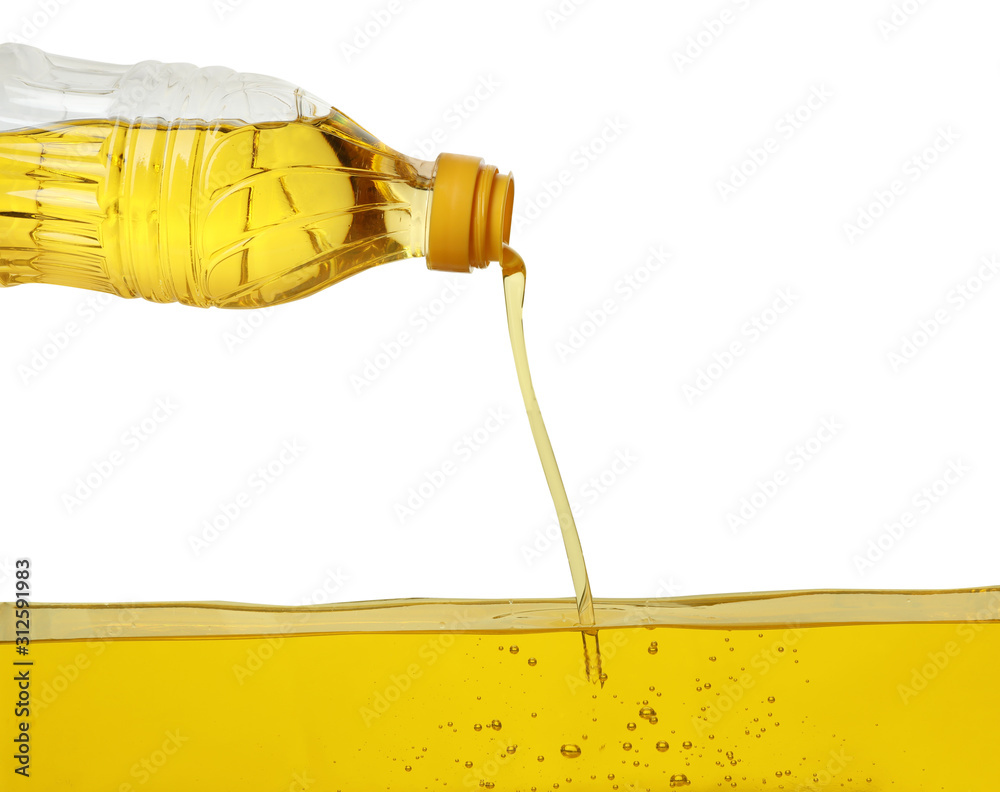 Pouring cooking oil from bottle on white background Stock Photo Adobe