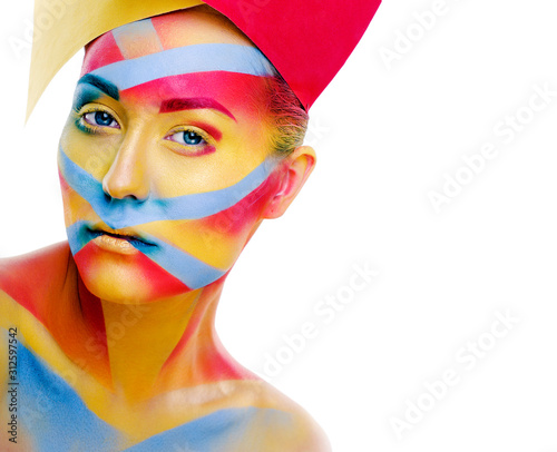 woman with creative geometry make up, red, yellow, blue closeup smiling colored