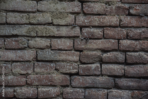 Dark broken cement brick texture