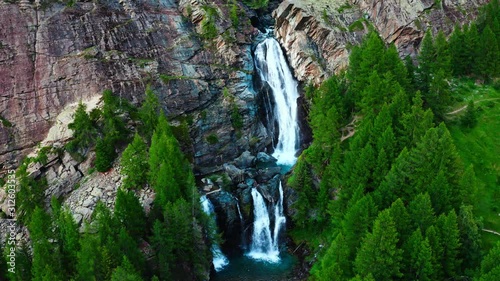 awesome huge waterfall in the italien aosta valley photo