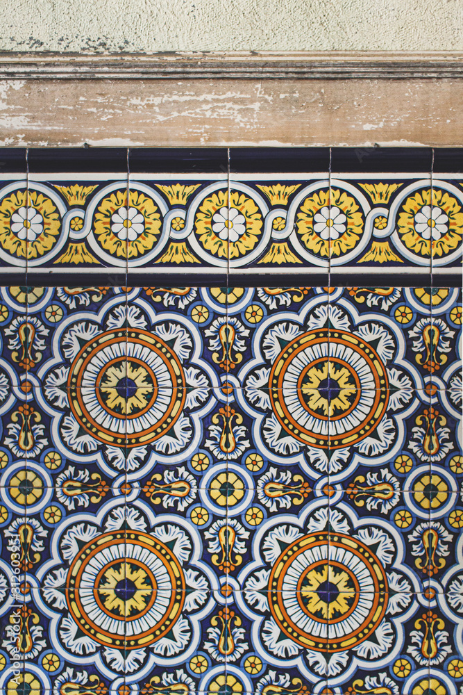 Obraz premium Painted tiles in old and ruined abandoned house.