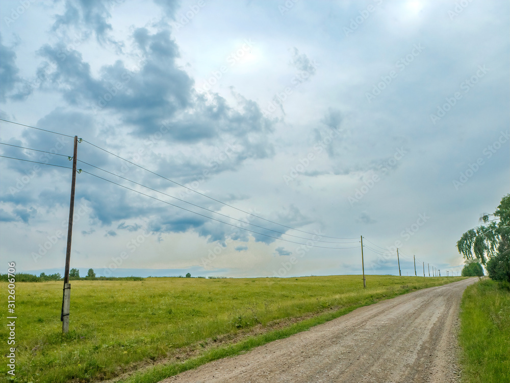 autumn landscape with rain clouds and road autumn landscape with rain clouds and road