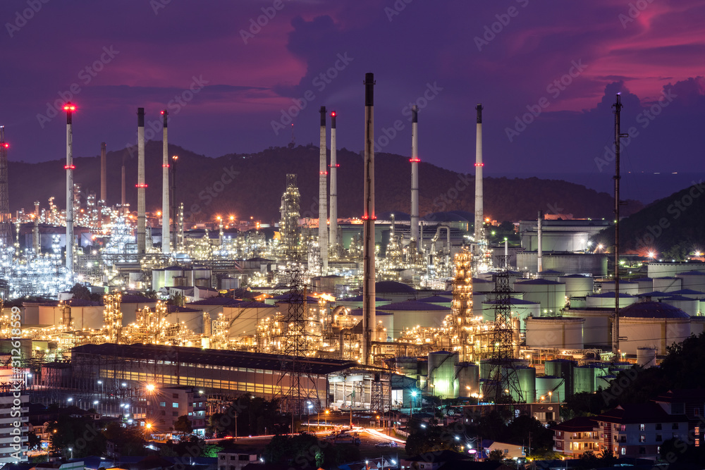 Oil refinery plant with twilight sky