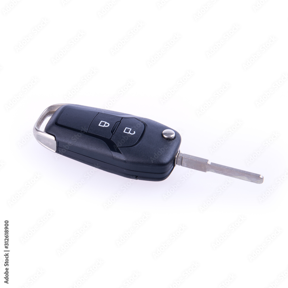 key or car key with remote on background.