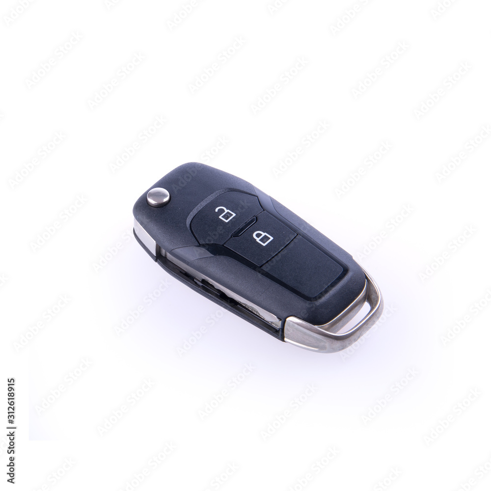 key or car key with remote on background.