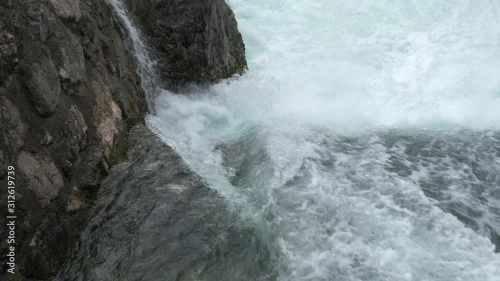 Violent water rapids in channel forming whitewater after storm Violent water rapids in channel forming whitewater after storm