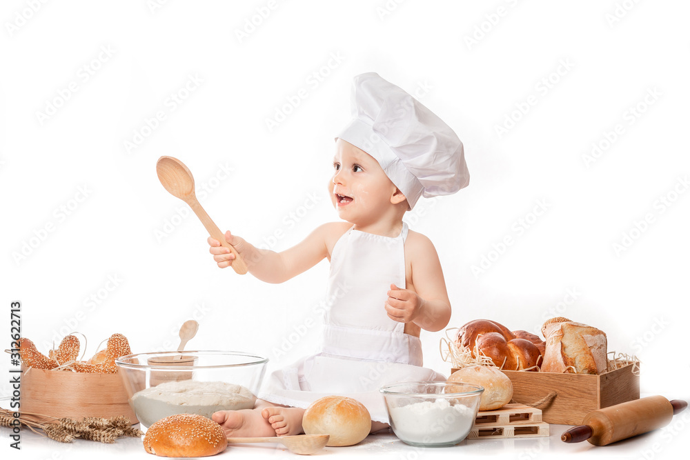 baby cook sits on the table bread bread flour baby cook sits on the table bread bread flour