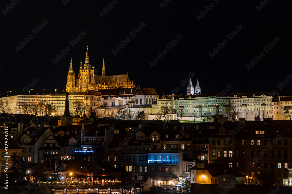 PRAGUE, CZECH REPUBLIC - DECEMBER 2019: A view of the Prague Castle at Night Time