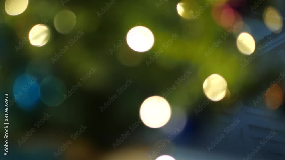 Christmas tree with colored balls and bokeh Christmas tree with colored balls and bokeh