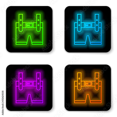 Glowing neon line Lederhosen icon isolated on white background. Traditional bavarian clothing. Oktoberfest outfit. Pants with suspenders. Patrick day. Black square button. Vector Illustration